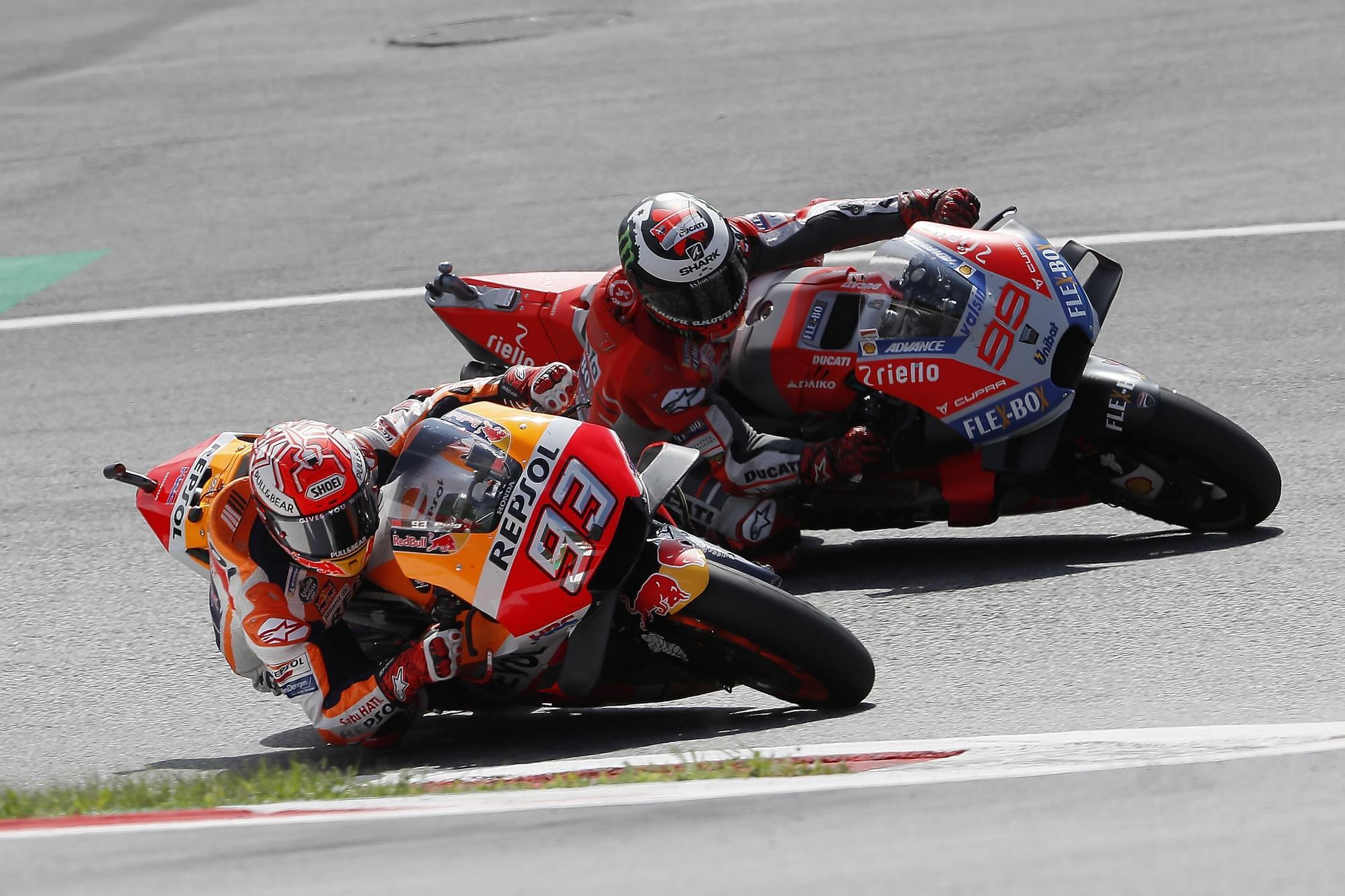 Lorenzo keeps Marquez at bay to win Austrian GP