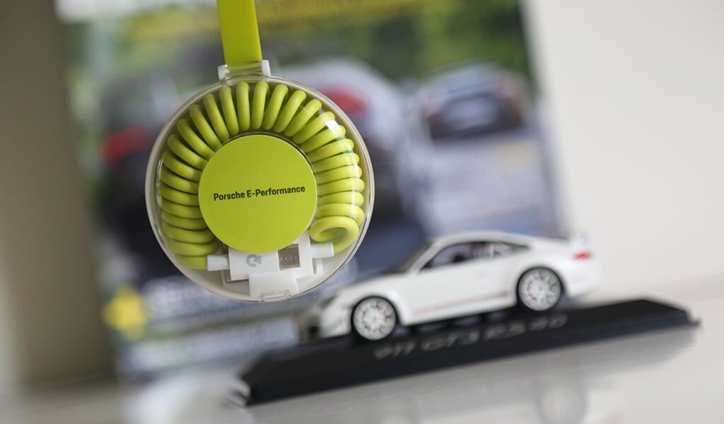 Win a Porsche E-Performance Universal Charging Cable by participating in the #EvoPorscheContest